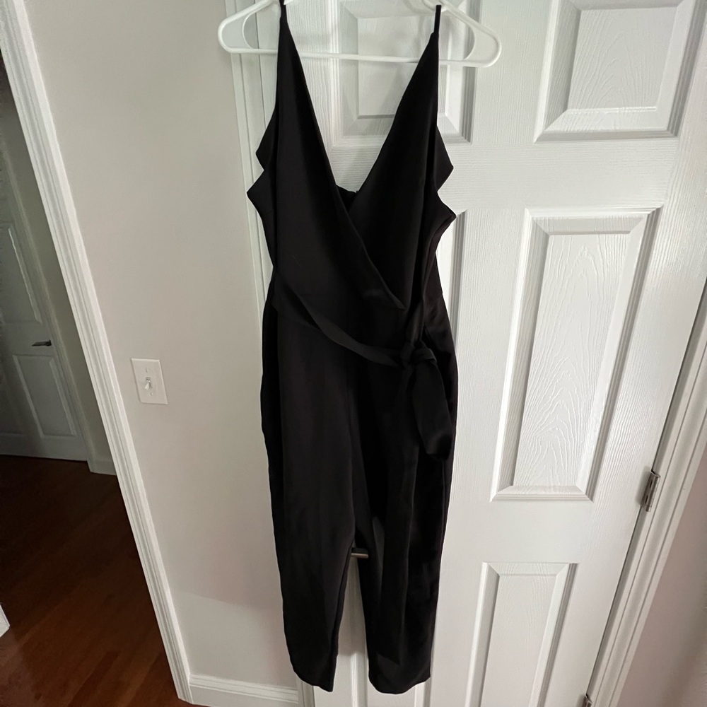 New with tags! Black jumpsuit size 12- smoke free home